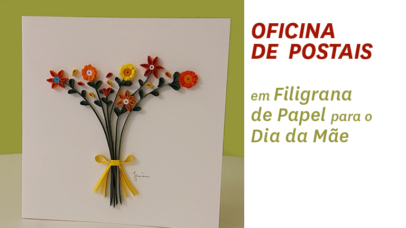 Fotografia de uma ramo de flores feitas em filigrana de papel.